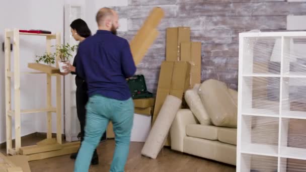 Man from delivery service arriving with boxes and documents to be signed — Stock Video