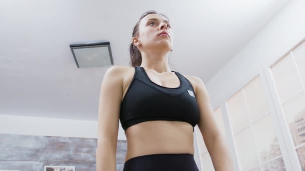 Attractive brunette doing her daily yoga meditation — Stock Video