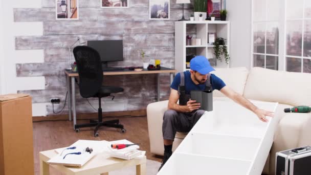 Worker using tablet computer to check instructions — 비디오