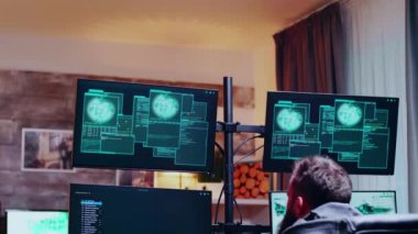 Male hacker covering his face after a failed hack