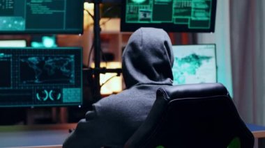 Wanted cyber criminal wearing a white mask