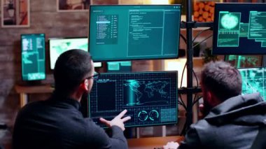 Two male hacker making their attack plan