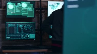 Female hacker wearing a hoodie to cover her face