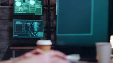 Female hacker wearing a hoodie using a dangerous virus