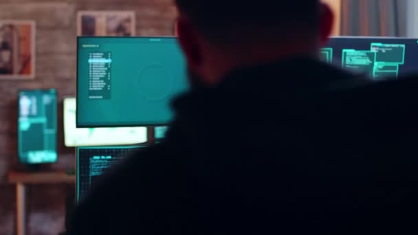 Male hacker typing on keyboard a dangerous malware — Wideo stockowe