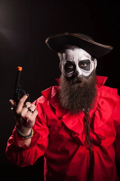 Crazy and spooky medieval pirate with his pistol — Stock Photo, Image