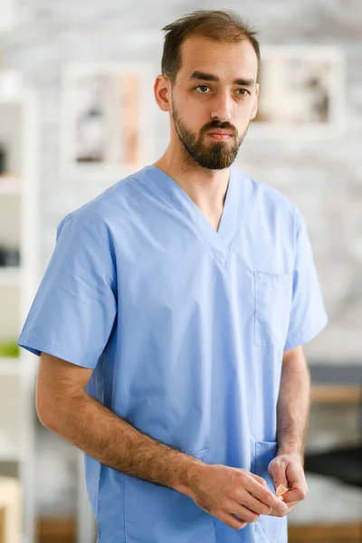 Portrait of young doctor in his uniform — Stock Photo, Image