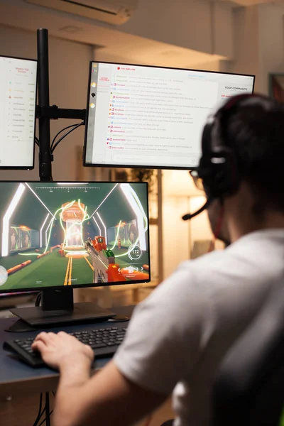 Young man in a stream of online shooter game — Stock Photo, Image