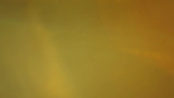 Siyah arkaplanda optik mercek parlamaları — Stok video