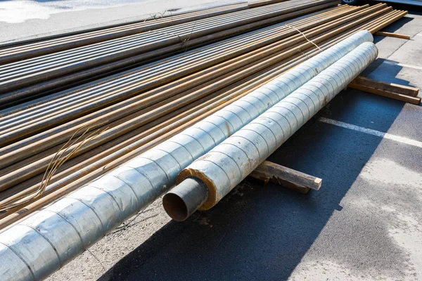metal pipes with thermal insulation in production