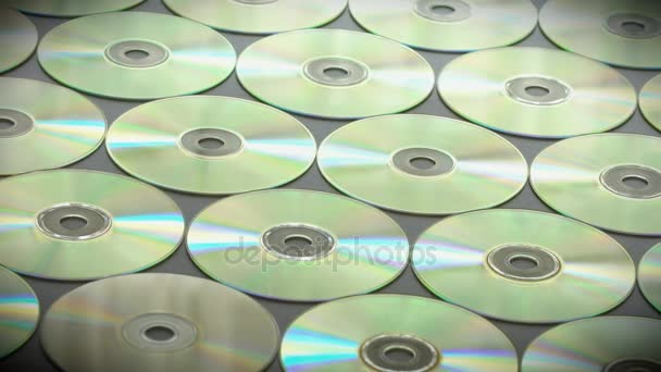 Slow Motion ordnade i rader av cd eller DVD-skivor — Stockvideo