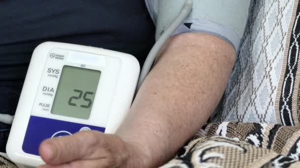 Grandmother Measures Blood Pressure — Stock Video