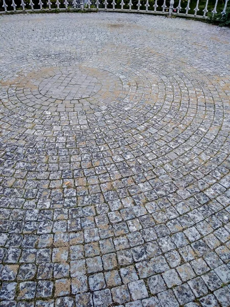 Fondo abstracto del antiguo pavimento de adoquines. — Foto de Stock