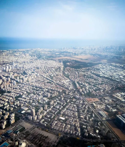 View of Tel Aviv and the Mediterranean Sea from the window of the plane taking off from the airport Ben Gurion — Stock Photo, Image