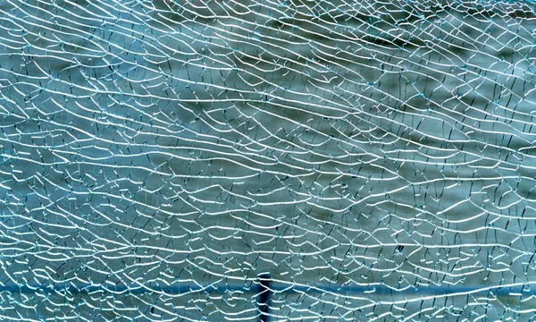 Close-up van gebroken glas textuur — Stockfoto