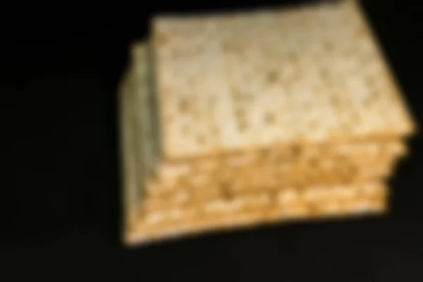 Zamazane Tło Stosem Żydowskiego Chleba Pesach Matzah Substytutem Chleba Żydowskie — Zdjęcie stockowe