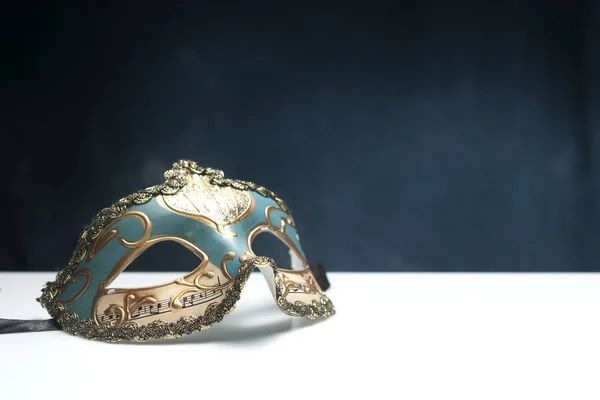 Venetian mask on white table — Stock Photo, Image