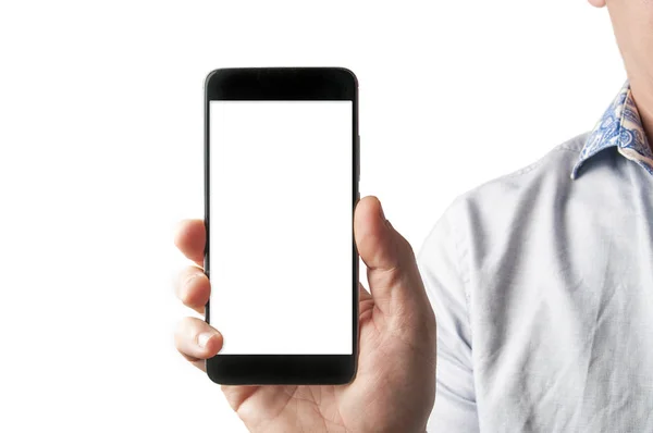 A business man in blue shirt hold a blank screen smartphone in f — Stock Photo, Image