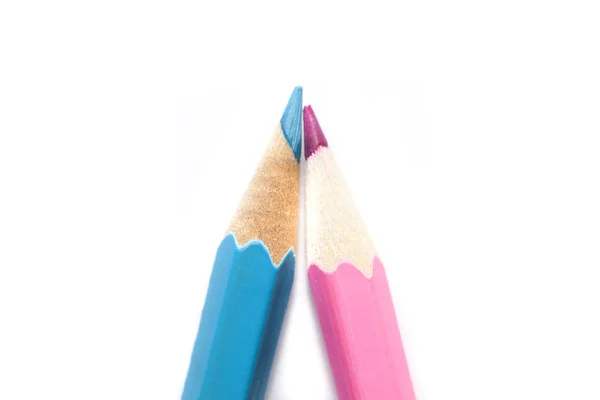 浅蓝色和粉色铅笔,白色背景,男孩或女孩用 — 图库照片