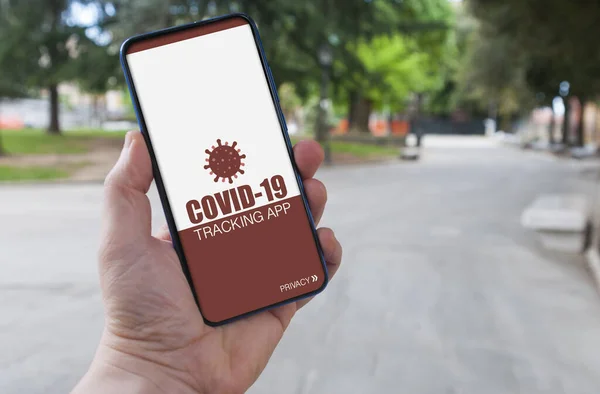Man using a covid-19 tracking app to prevent contagion from coronavirus