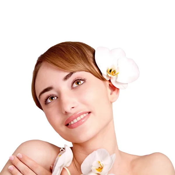 Beautiful girl with orchid flowers — Stock Photo, Image