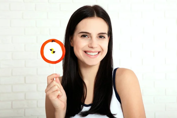 Closeup of woman eating. Smiling happy women with candy. — Stock Photo, Image