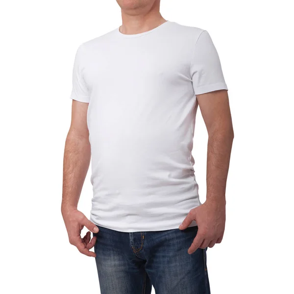 Hombre con camiseta azul en blanco sobre fondo de pared de ladrillo gris con espacio para copiar. Vista frontal — Foto de Stock