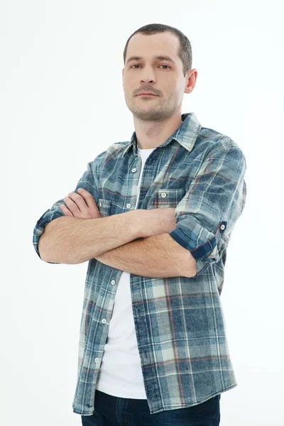 Homem bonito em camisa xadrez isolado no fundo branco — Fotografia de Stock