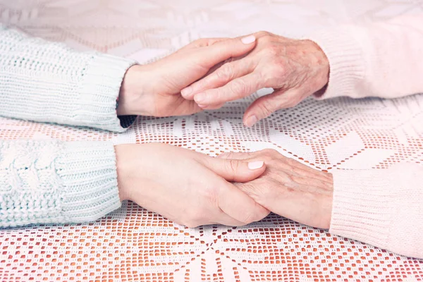 Helping hands, care for the elderly concept — Stock Photo, Image