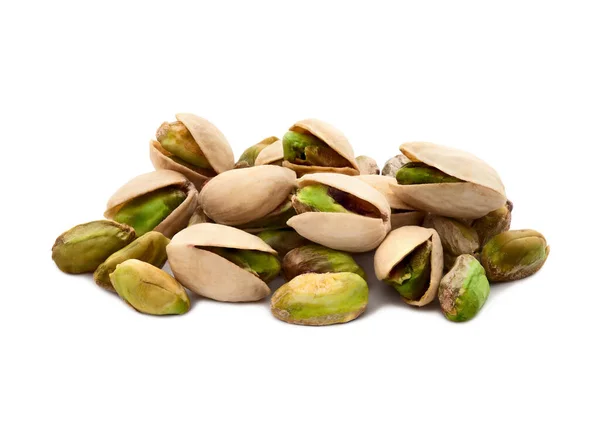 Pistachio nuts. Many pistachios on white. — Stock Photo, Image