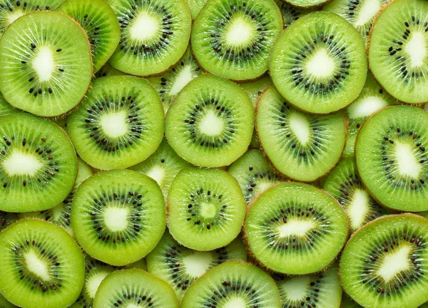 Lot Kiwi Slices Textured Background — Stock Photo, Image