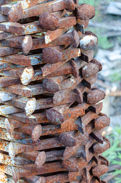 old railroad nails stack up