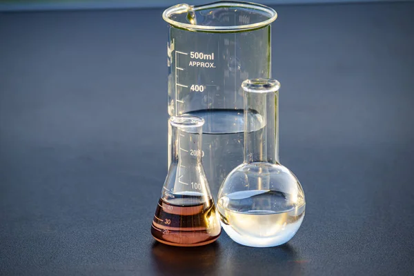 transparent glass tubes with fluid liquid, chemistry glassware