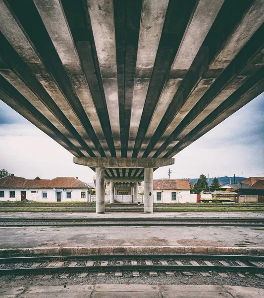 Retro vintage technology, old train tracks under the bridge