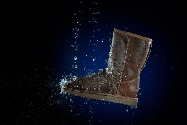 Shoes waterproof protected brown color with water droplets.  wax protect  from — Stock Photo, Image