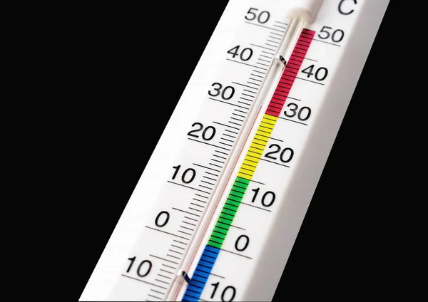 Temperature gauge on black background — Stock Photo, Image