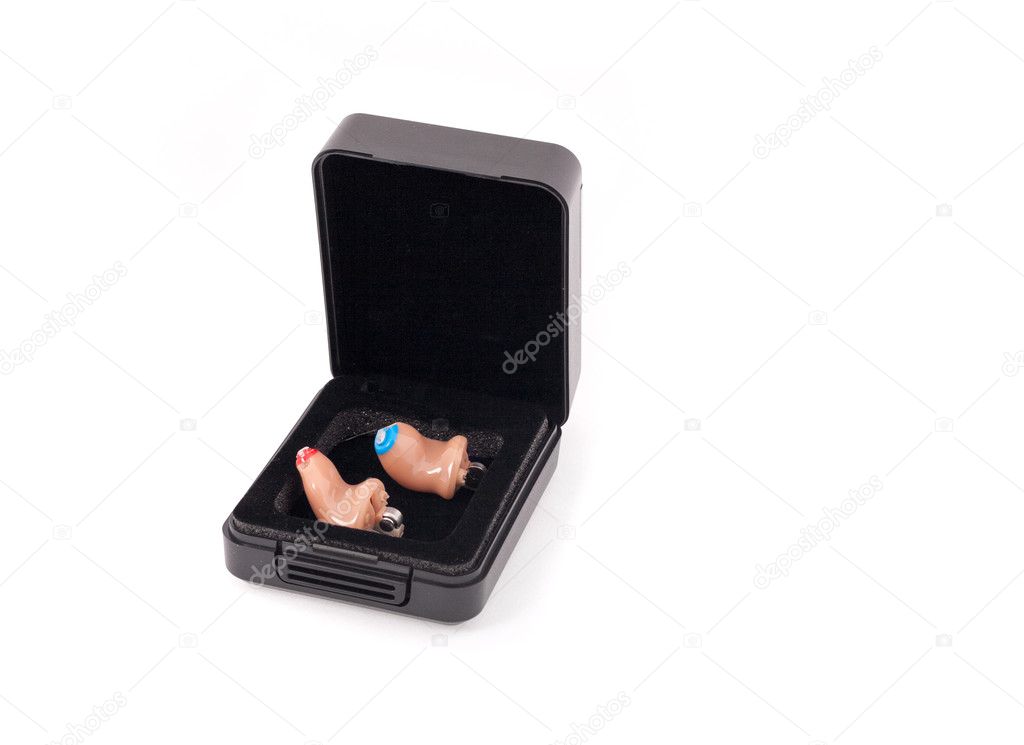 Pair of hearing aids (left and right) in a box.