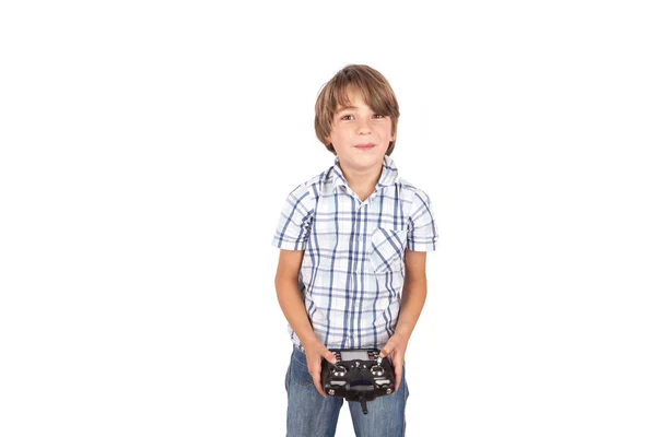 Jongen met een drone-afstandsbediening geïsoleerd op witte achtergrond — Stockfoto