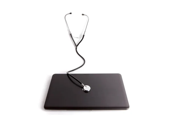 Stetoskop na uzavřené notebooku — Stock fotografie