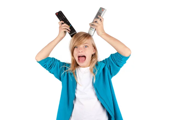 Young girl making fun with remote controls — Stock Photo, Image