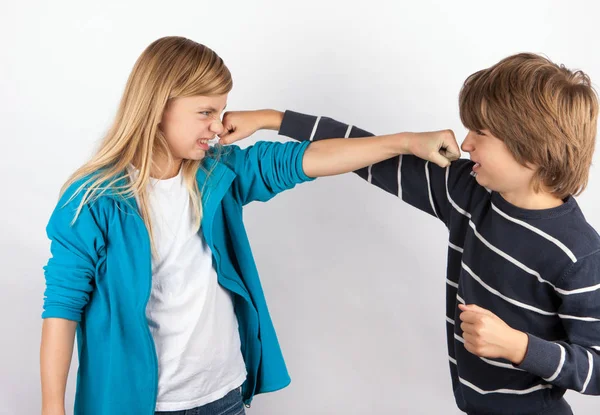 Brother and sister fist fighting — Stock Photo, Image