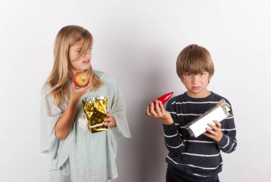 Children shocked by strange gifts. The present boxes contained a clipart