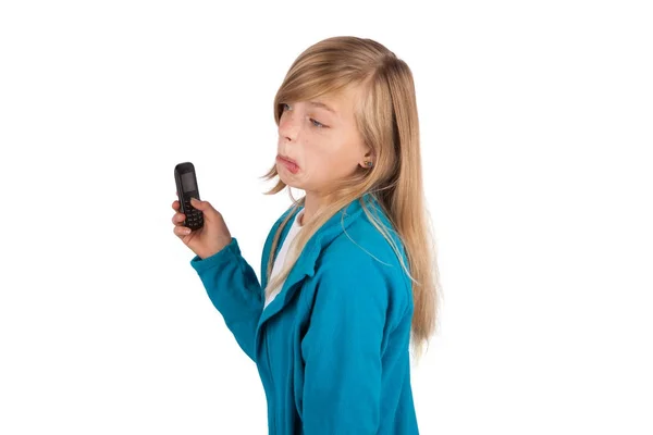 Cute girl very disappointed because she got only a simple mobile — Stock Photo, Image