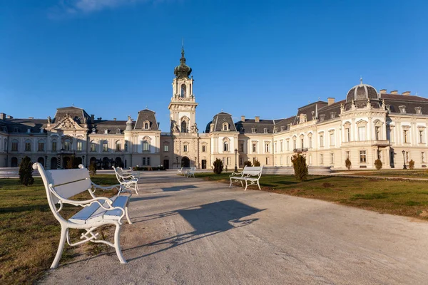 The Festetics baroque castle with white benches in the front nea — Stock Photo, Image