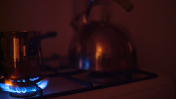 Little saucepan is heated on a gas burner — Stock Video