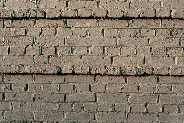 Alte Mauer aus Ziegeln matte Farben. — Stockfoto