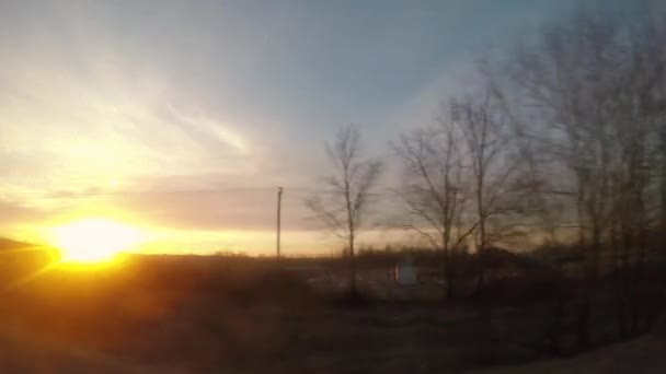 Puesta de sol en la ventana del coche — Vídeos de Stock