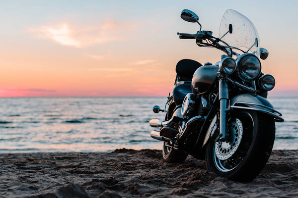 Motorcycle chopper against the sea.