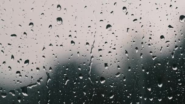 Gouttes de pluie sur verre ralenti — Video