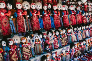 Dolls in Armenian national costumes. Flea market Vernissage Yerevan, Armenia clipart